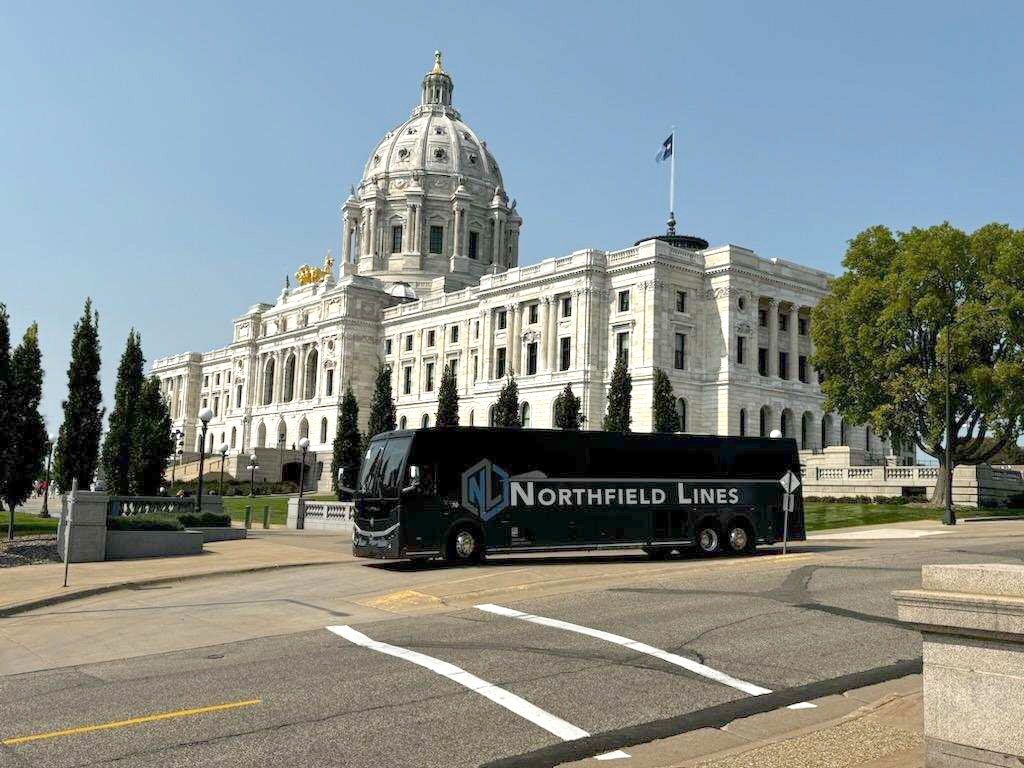 Northfield lines bus in front of the Minnesota state capital